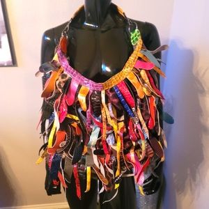 ONE OF A KIND LEATHER PURSE WITH LEATHER PIECES AS DECOR